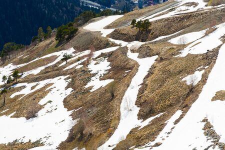Brown part of Caucasus snow mountains in the winter season.の写真素材