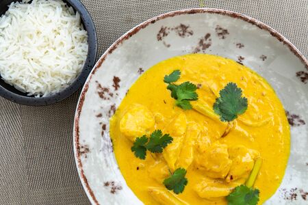Spicy curry with rice - The traditional Asian food.の写真素材