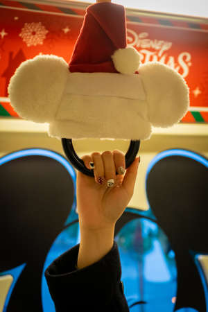 TOKYO, JAPAN - 25 NOVEMBER, 2019 : Tokyo Disneysea christmas theme Santacros hat combine with Mickey...