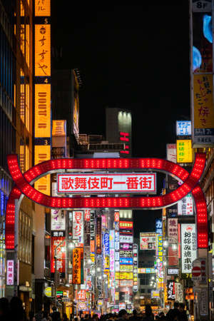 TOKYO, JAPAN - 24 NOVEMBER, 2019 : night life and many billboards in Kabukicho district - The most famous place of tourists called Shinjuku - Tokyo, Japan.のeditorial素材