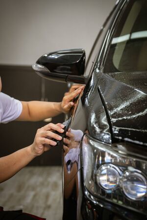 Car cleaning auto service : the man cleaning and polishes. car detailing concepts. Selective focusedの写真素材
