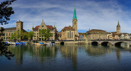 ZURICH, SWITZERLAND - MAY 22 : Panoramic view of historic Zurich city center with famous Fraumunster Church and river Limmat at Lake Zurich , Canton of Zurich, Switzerland on May 22,2016のeditorial素材