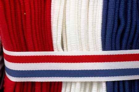 A bundle of kitchen towels in red, white and blueの写真素材