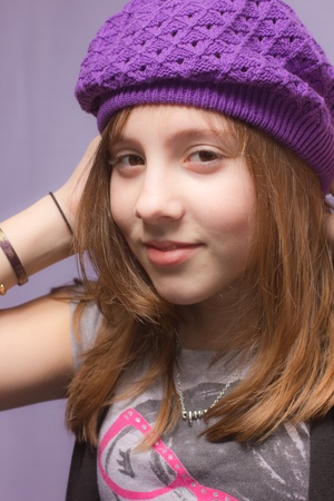A girl wearing a purple hatの写真素材