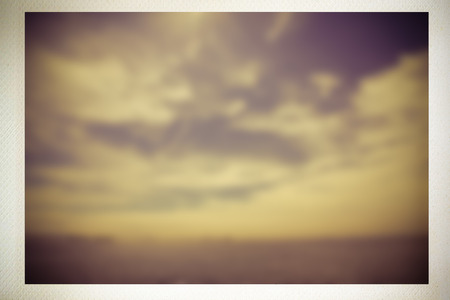Abstract defocused nature landscape of sky and shore in vintage photograph styleの写真素材