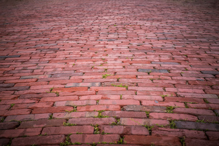 old cobblestone brick roadの写真素材