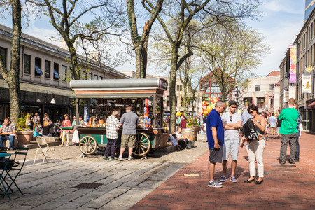 BOSTON, MASSACHUSETTS - MAY 14, 2016: View with people of outdoor market at Faneuil Hall Quincy Market at the Government Center in the historic city of Boston.のeditorial素材
