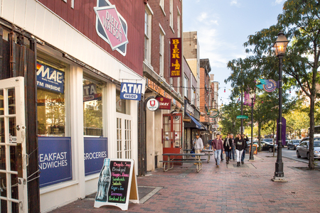 Philadelphia, Pennsylvania, USA - October 9, 2016: Street view along landmark Market Street in Old City Philadelphia, PA with people in view. Old City is well known for it's many historical sites.のeditorial素材