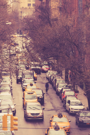 NEW YORK CITY - MARCH 29, 2018: New York City Manhattan street scene with cars depicting city life on a typical weekday afternoonのeditorial素材