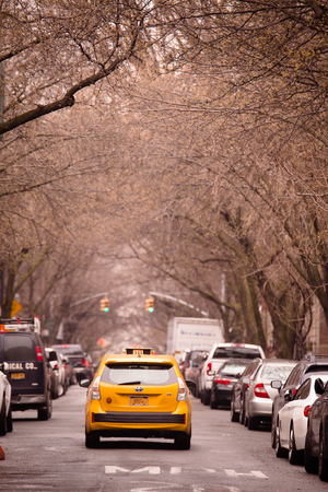 NEW YORK CITY - MARCH 29, 2018: New York City Manhattan street scene with cars depicting city life...