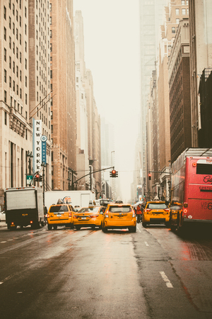 NEW YORK CITY - MARCH 29, 2018: New York City Manhattan street scene with cars depicting city life on a typical weekday afternoonのeditorial素材