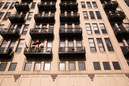 View of apartment building exterior with windows and balconiesのeditorial素材