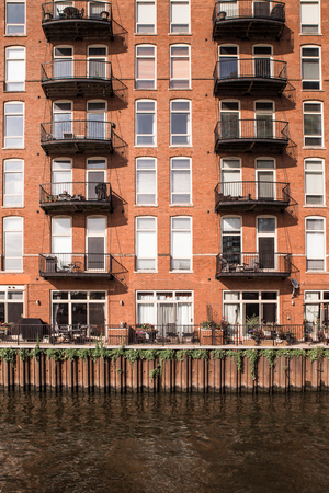 View of apartment building exterior with windows and balconies