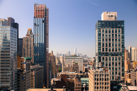 New York City Manhattan cityscape of buildings at midtown on sunny dayのeditorial素材