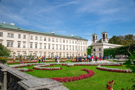 View from beautiful Mirabelle Gardens and Palace in Salzburg Austria on a sunny day.