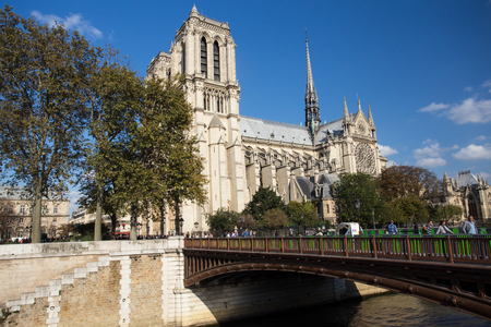 PARIS, FRANCE - OCTOBER 10, 2014: View of Notre Dame Cathedral in Paris France with people visibleのeditorial素材