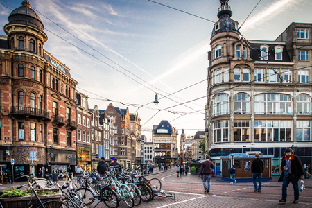 AMSTERDAM, NETHERLANDS - SEPTEMBER 1, 2018:  Street scene in shopping district with people and old architecture visible from the city of Amsterdamのeditorial素材