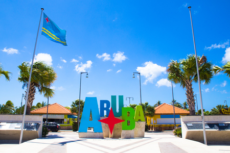 Colorful Aruba welcome sign on a sunny dayの写真素材
