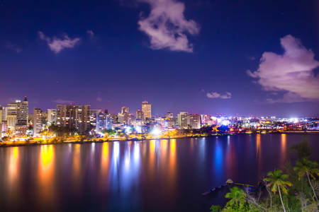 Beautiful Condado Beach, San Juan Puerto Rico seen at night with bay, buildings and lightsの写真素材