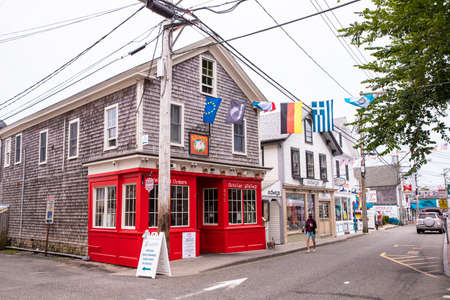 Provincetown, Massachusetts, USA - July 30, 2020: Street scene in Provincetown, MA on Cape Cod in historic tourist district with people visible.のeditorial素材