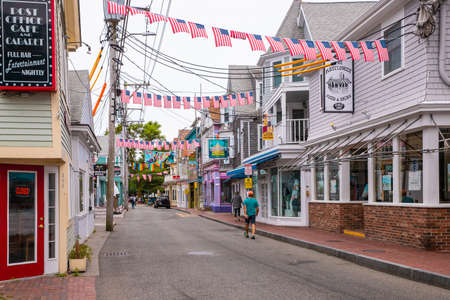 Provincetown, Massachusetts, USA - July 30, 2020: Street scene in Provincetown, MA on Cape Cod in historic tourist district with people visible.のeditorial素材