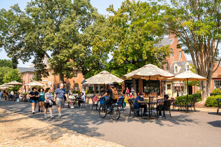 Williamsburg, Virginia, USA - September 12, 2021:  Street scene from historic Williamsburg Virginia at Merchants Square with people visible.のeditorial素材