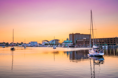 View of Hampton Virginia downtown waterfront district seen at sunset under colorful skyのeditorial素材