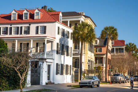 Charleston, South Carolina, USA - March 18, 2022:  Street scene in the historic southern city of Charleston South Carolina with typical homes in view