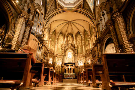 Monserrat, Spain - April 20, 2022:  Interior view of historic basilica at Montserrat Monastery in Spain,のeditorial素材