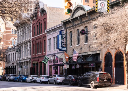 Austin, Texas - February 22, 2024: View of historic Sixth Street known for its many live music bars...