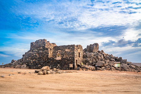 Abandoned historic Bushiribana mine on the beach in Arubaの写真素材