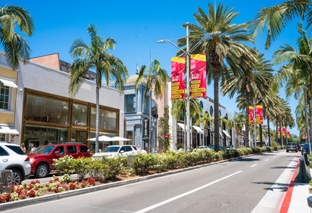 Beverly Hills, California - June 29, 2024:  Street scene on Rodeo Drive in Beverly Hills California with people and stores.のeditorial素材
