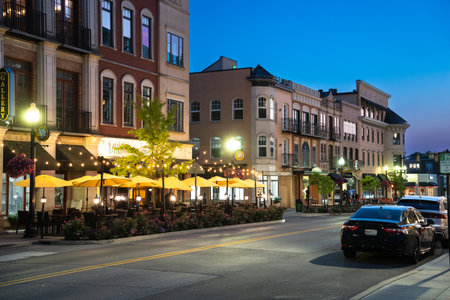 Carmel, Indiana - July 25, 2024:  Night street scene from midwest suburban city of Carmel Indiana along the Monon Trail near the Arts and Design District.のeditorial素材