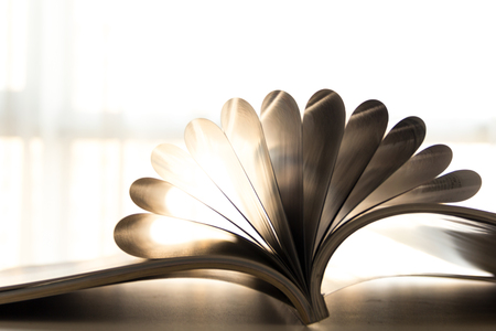 abtract row page of book with sunlightの写真素材