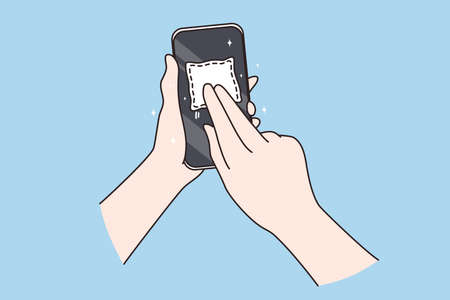 Dirty screen and microbes concept. Human Hand holding and cleaning mobile phone screen with napkin...