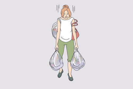 Carrying heavy bags tiredness concept. Young exhausted tired woman cartoon character going carrying many heavy shopping bags full of food from supermarket vector illustrationのイラスト素材