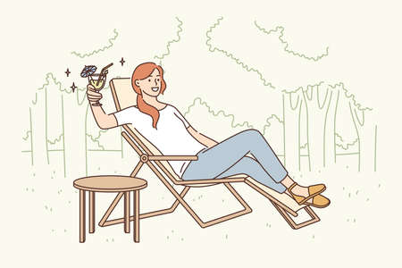 Relaxation and leisure activity concept. Smiling pretty woman cartoon character sitting in deck chair drinking fancy cocktail relaxing alone outdoors vector illustrationのイラスト素材