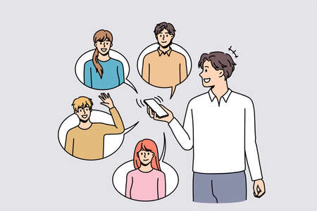 Smiling man use cellphone communicate with diverse friends online on social media. Happy guy with smartphone text message with colleagues on internet on gadget. Flat vector illustration.のイラスト素材