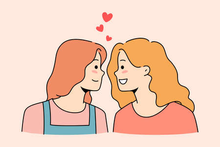 Happy lesbian women look in eyes show loveのイラスト素材