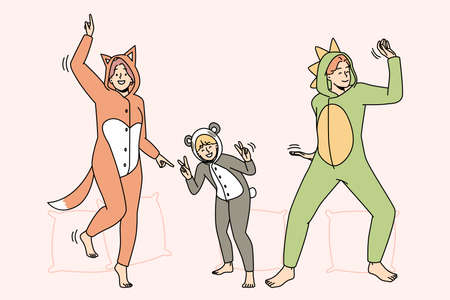 Smiling people have fun at pajama party