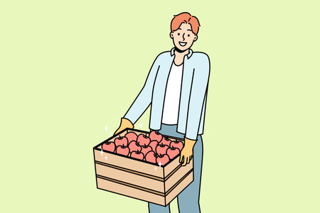 Smiling man with box of applesのイラスト素材