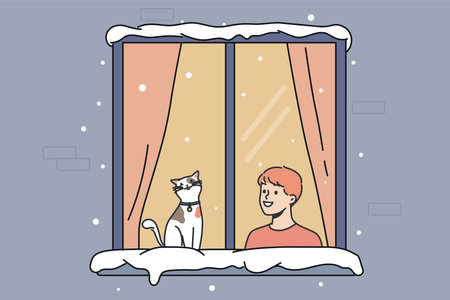 Smiling boy and cat in window during winterのイラスト素材