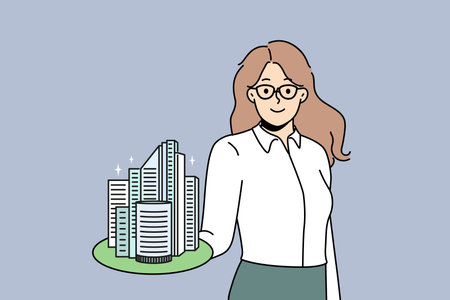 Smiling broker with building modelのイラスト素材