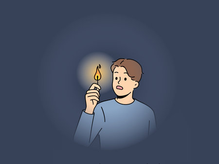 Scared man with lit match in darkのイラスト素材