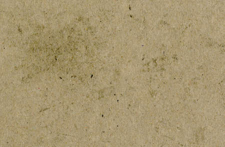 High quality uncoated, recycled pulp gray paperboard with dirt, stains and spots thick grain fiber, copyspace for text for high resolution wallpapers or mockupsの写真素材