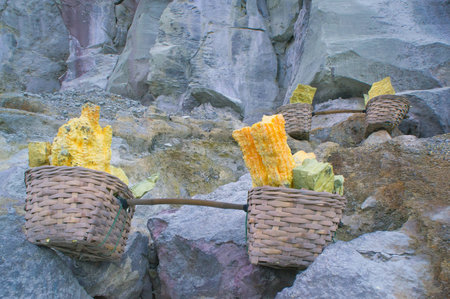 Sulfur carriers basket at Kawah Ijenの写真素材