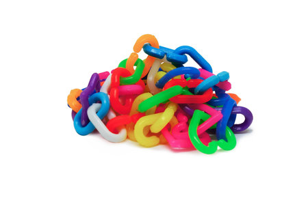 Colorful plastic chain toy on white backgroundの写真素材