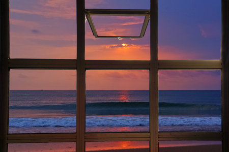 Open window to see twilight tone sunrise at sea in Thailandの写真素材
