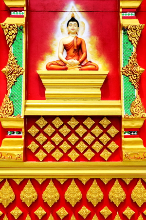 Thai mural and sculpture thai style on the wall of buddhist temple in Thailand.の写真素材