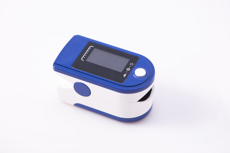 Close up. Pulse oximeter isolated on white background. Copy space. Top view